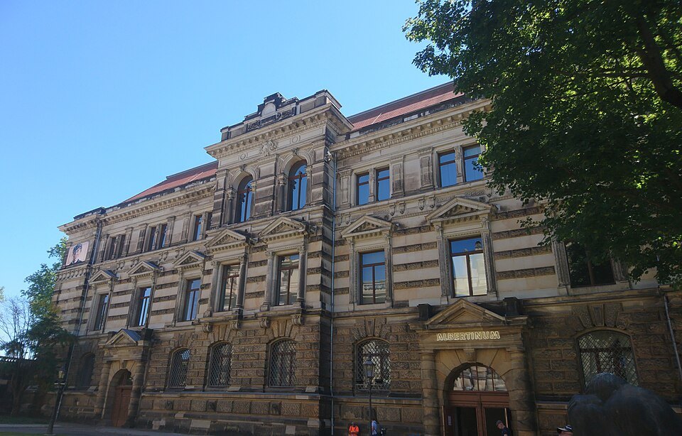 The Albertinum's sandstone facade under a blue sky