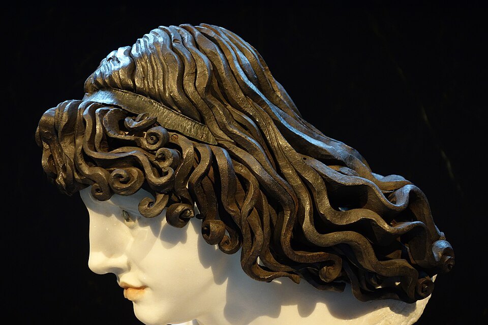 Bronze-haired bust of a muse