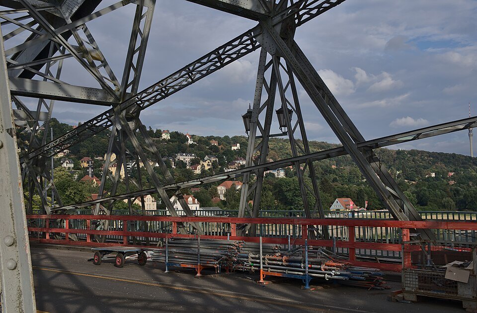 Riveted steel girders over the bridge deck