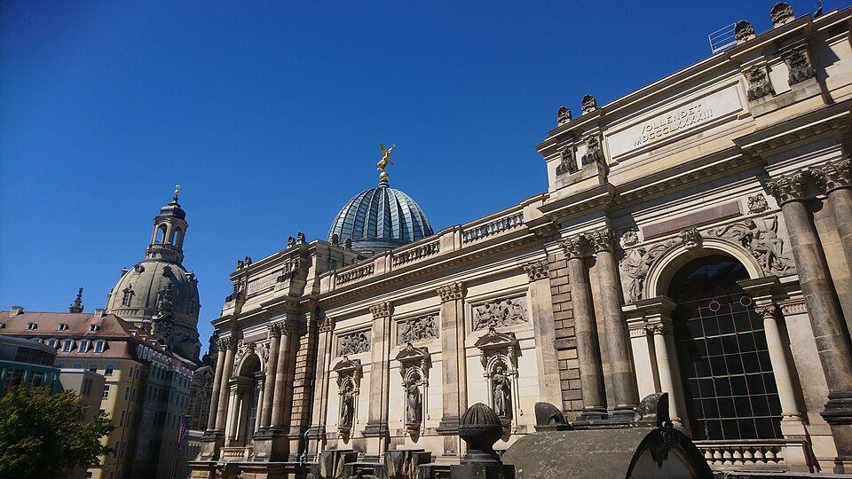 The academy's carved facade with the Frauenkirche behind