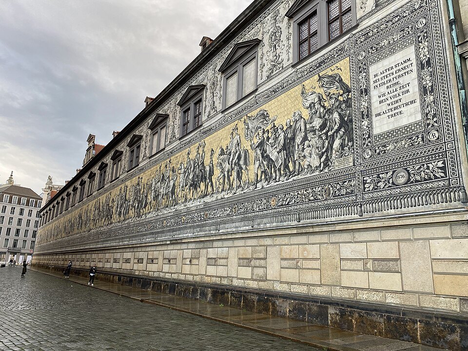 The long porcelain mural from the street's end