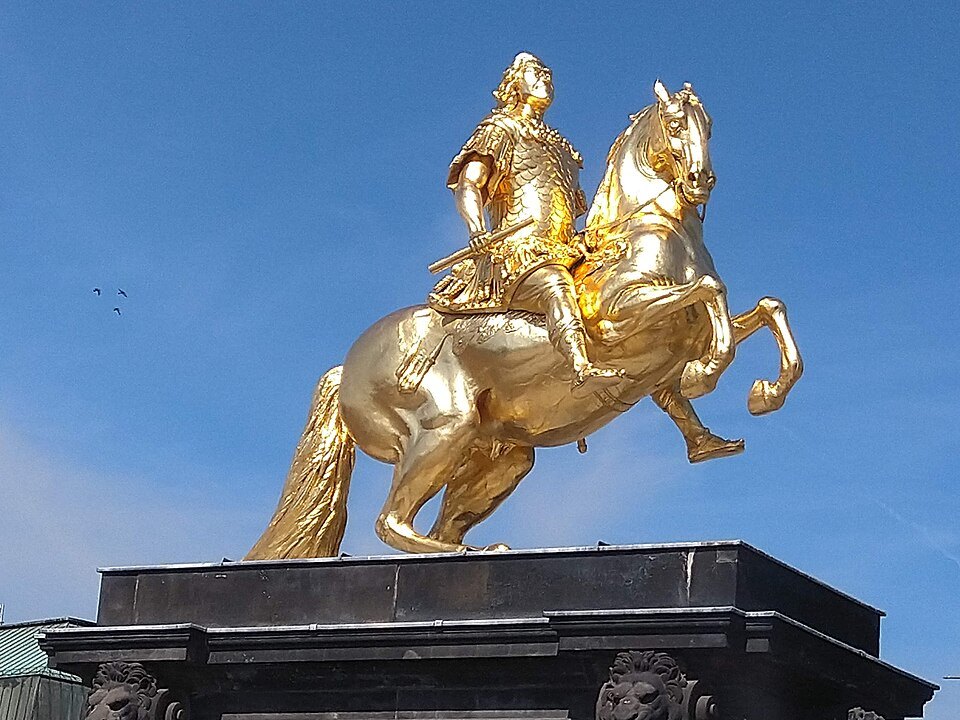 The Golden Rider against a clear sky