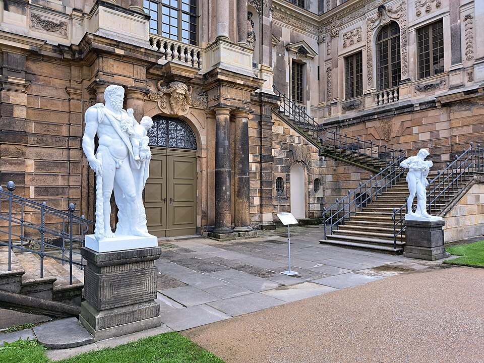 A marble Hercules beside the palace steps