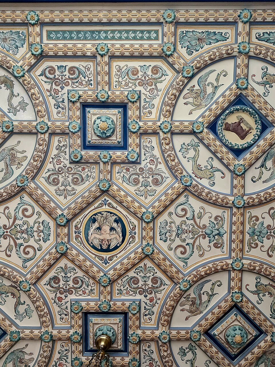 Patterned tiles on the salesroom ceiling