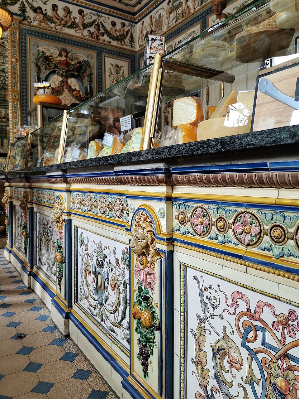 The tiled front of the dairy counter