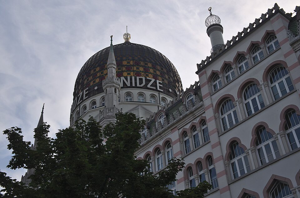 The dome and arched windows from the sidewalk