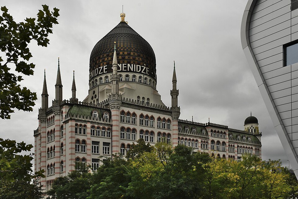 The Yenidze dome behind green trees